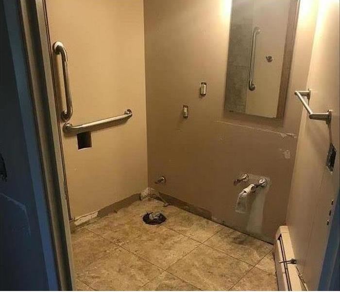 A bathroom after everything has been removed.