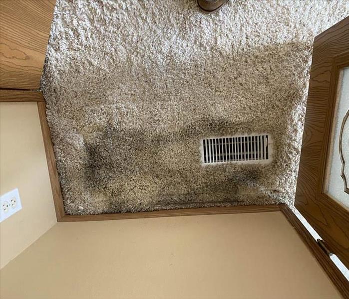 Carpet damage by an air vent